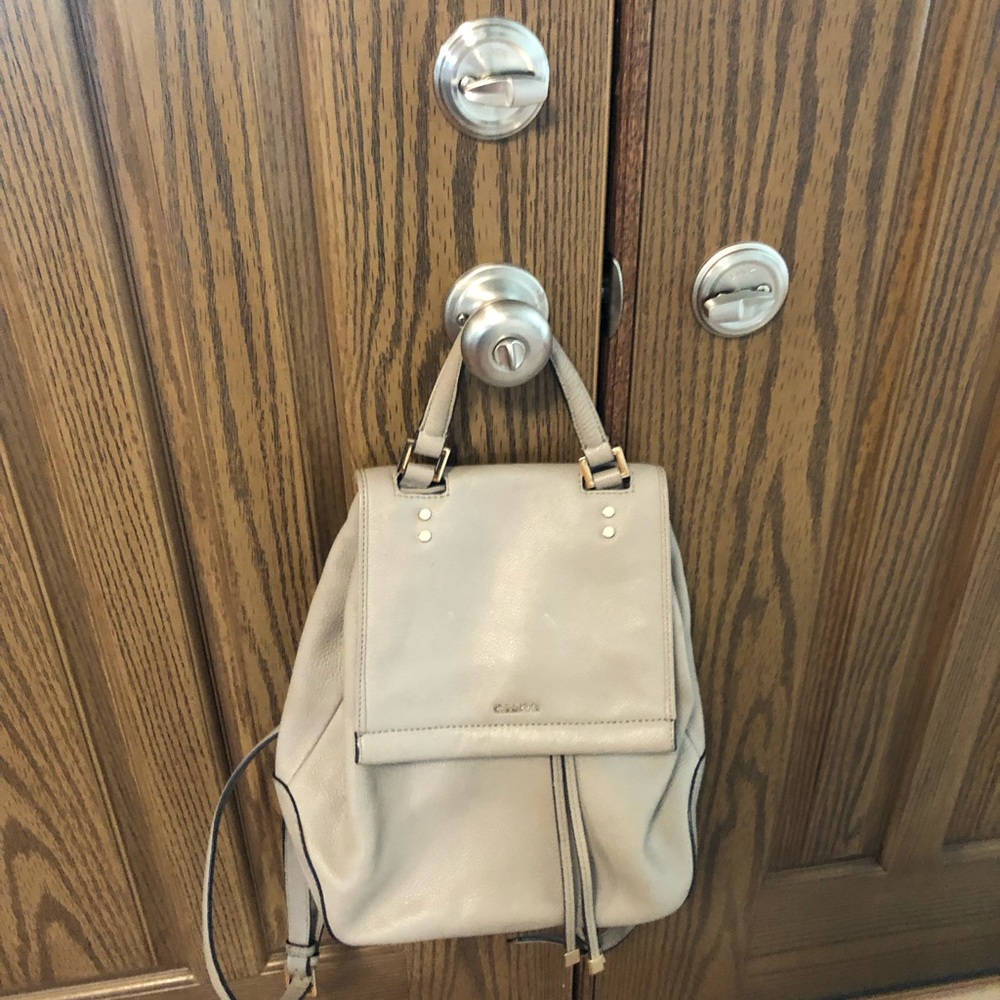 Calvin Klein leather backpack .It’s soft pebble leather texture.